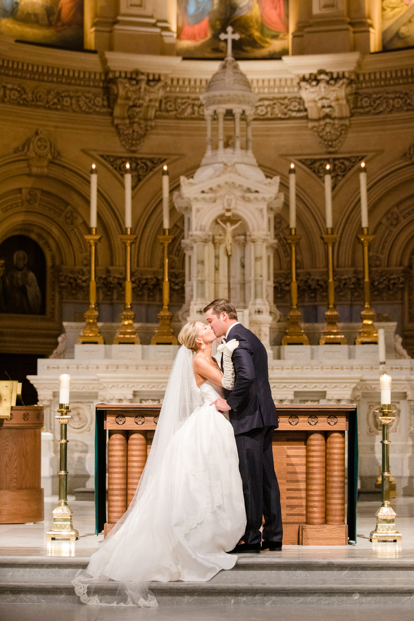 bride and groom ceremony kiss in church