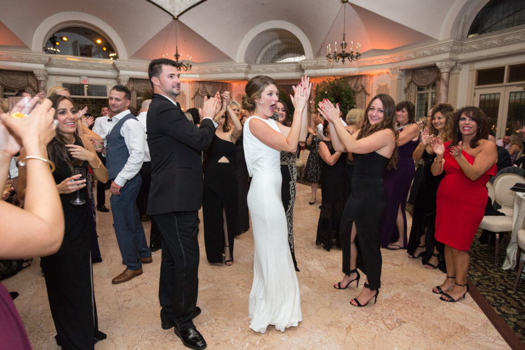 bride and groom cheering band