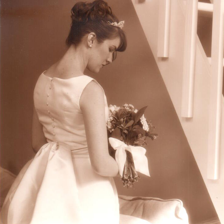 Bride in profile with flowers